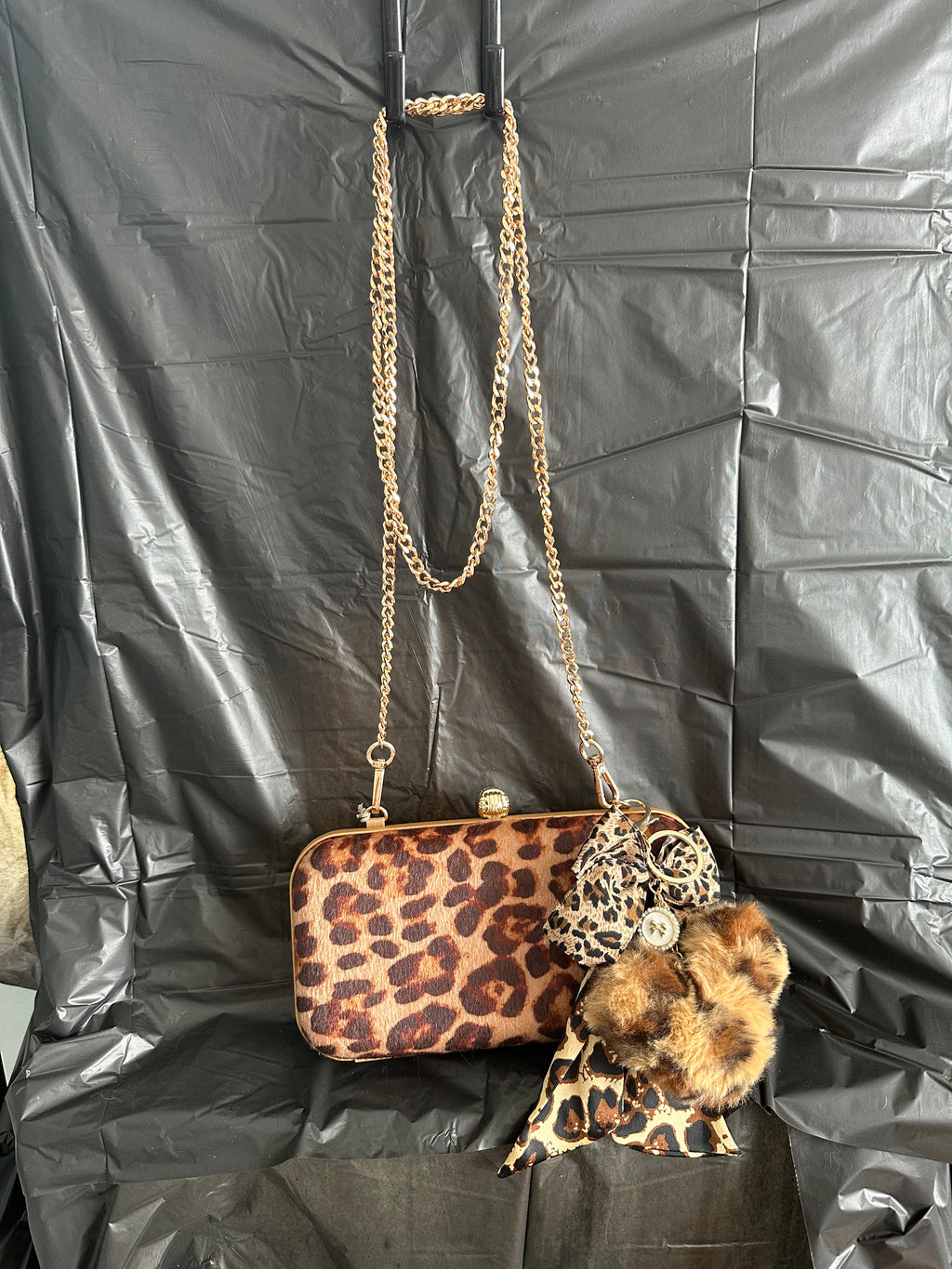 Brown Leopard Print Clutch with Gold-Tone Chain & Pom-Pom Charm