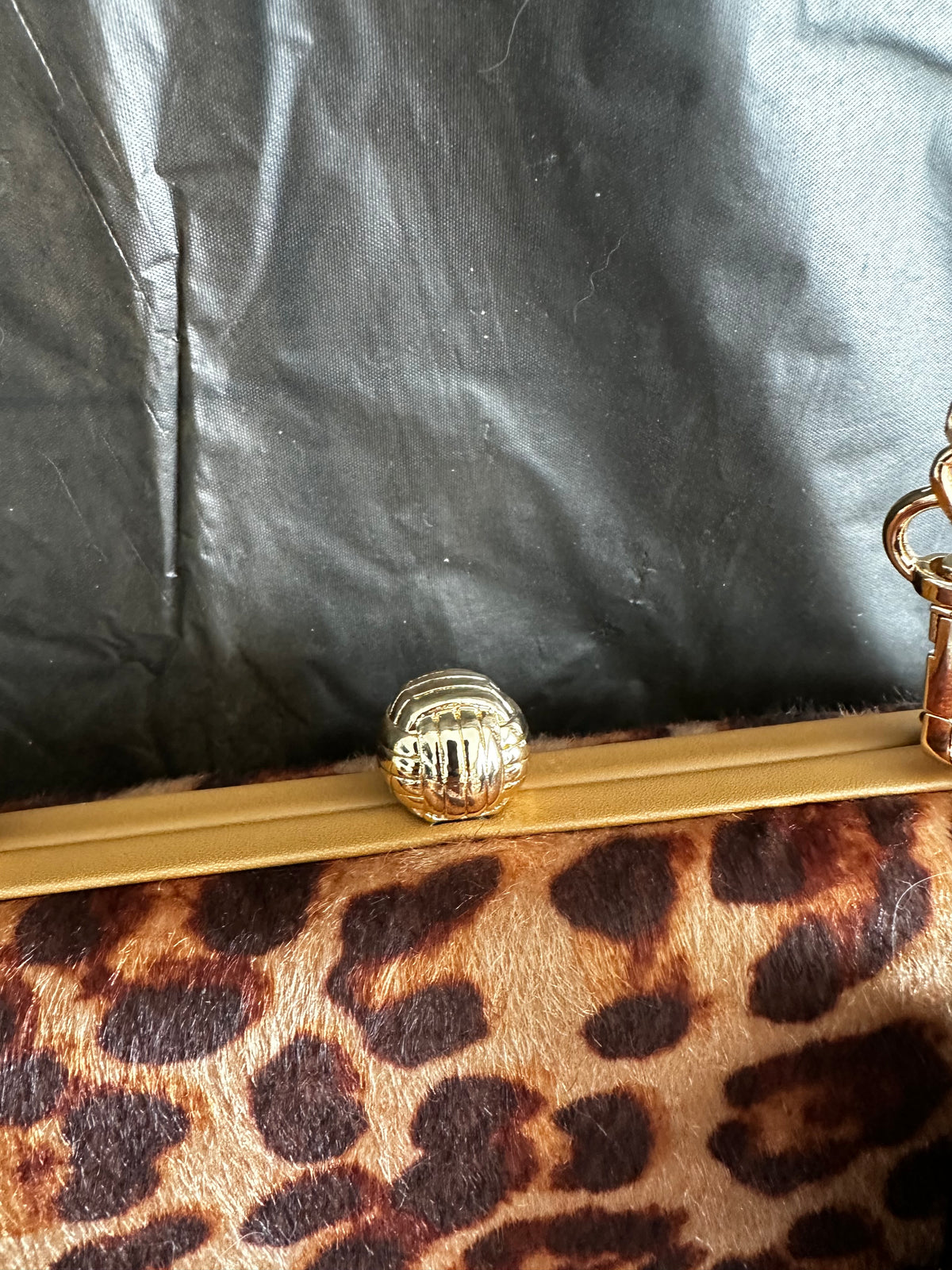 Brown Leopard Print Clutch with Gold-Tone Chain & Pom-Pom Charm