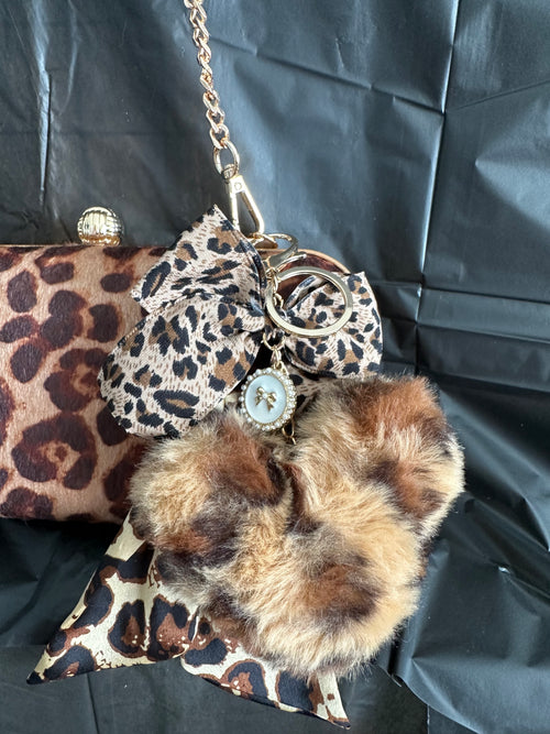 Brown Leopard Print Clutch with Gold-Tone Chain & Pom-Pom Charm